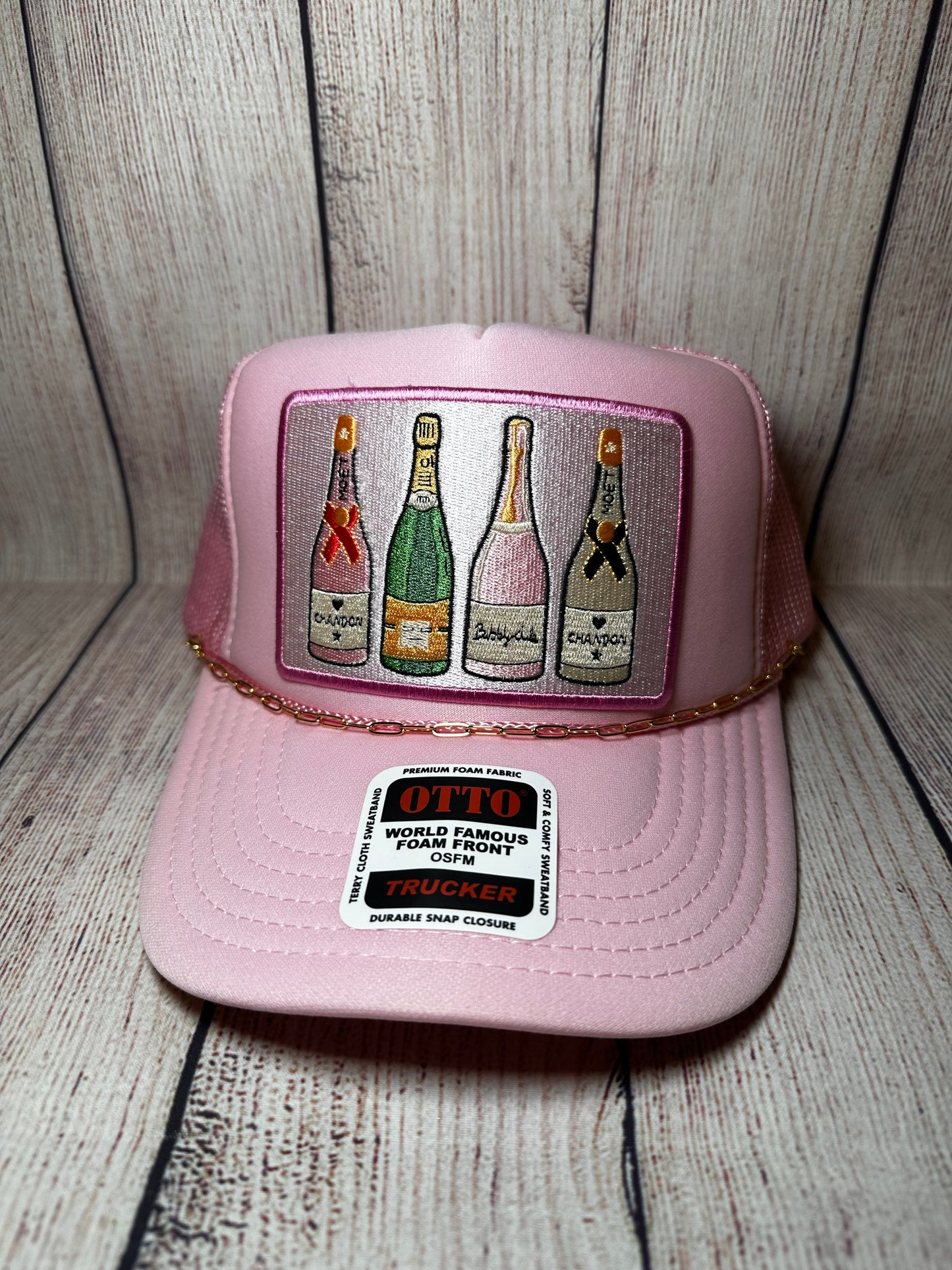 Pink champagne trucker hat