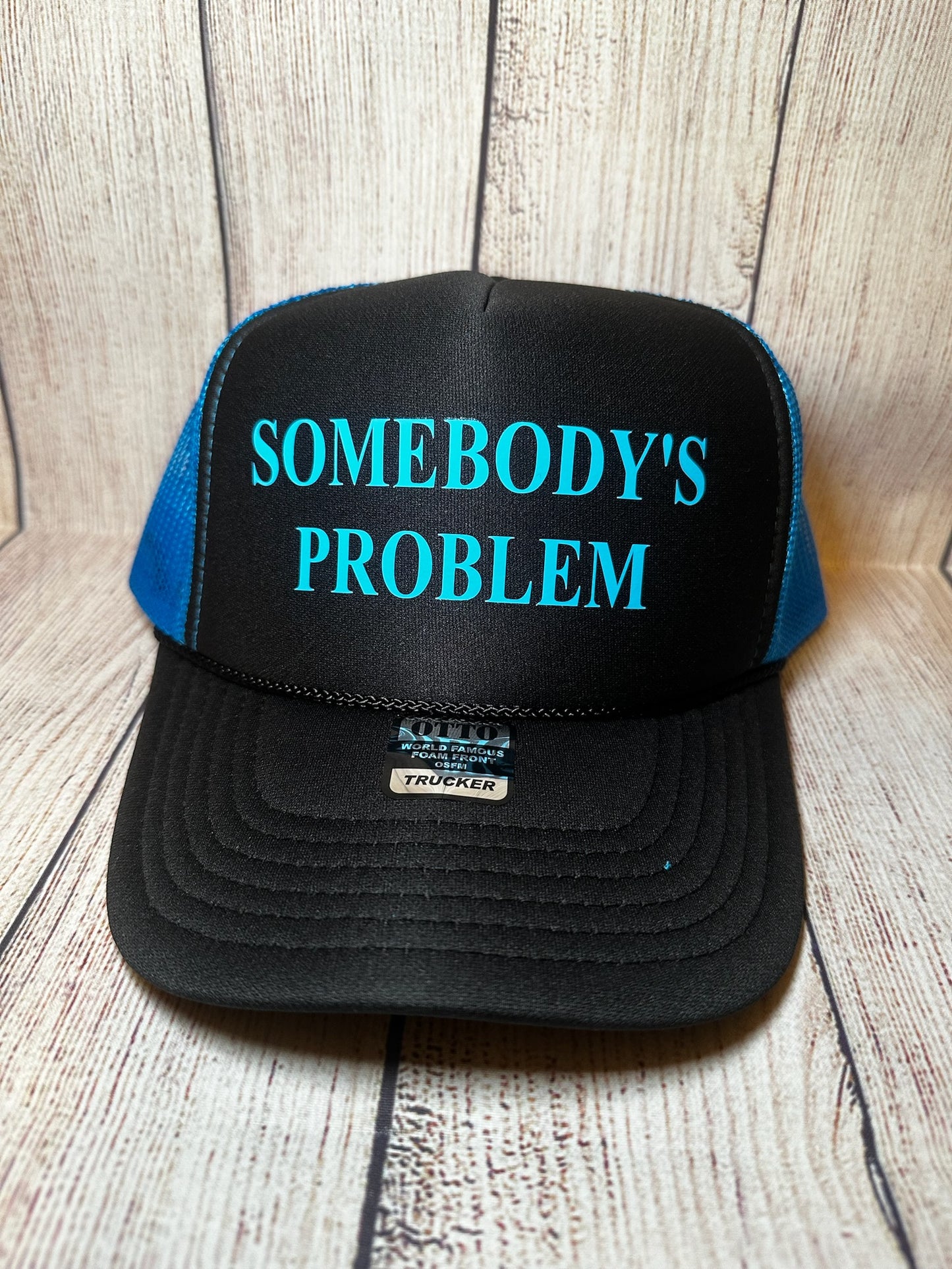 Somebody’s problem vinyl trucker hat