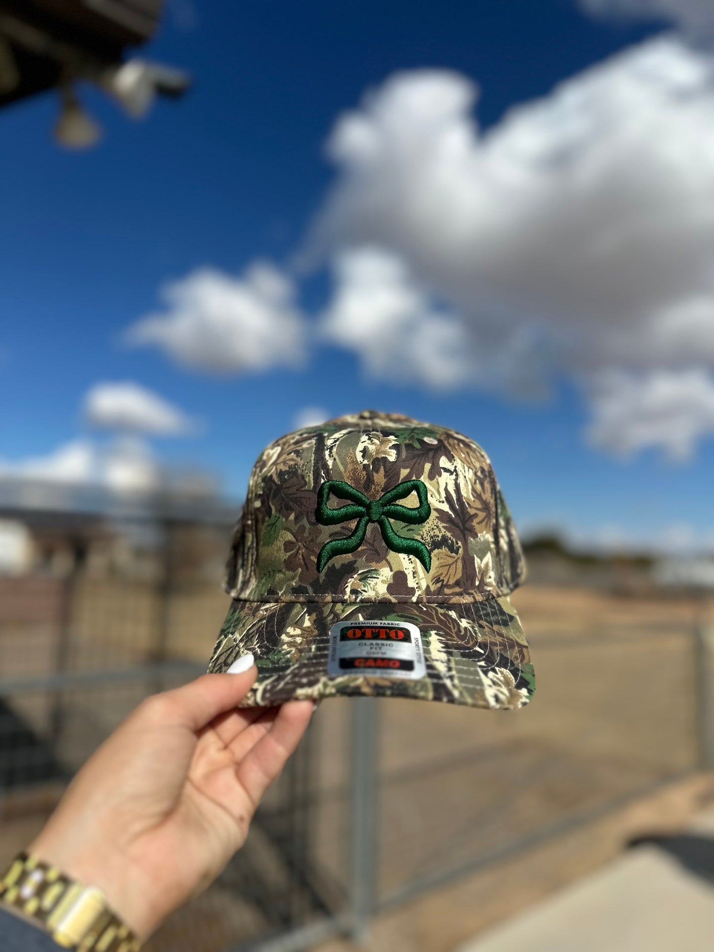 Bow puff embroidered trucker hat