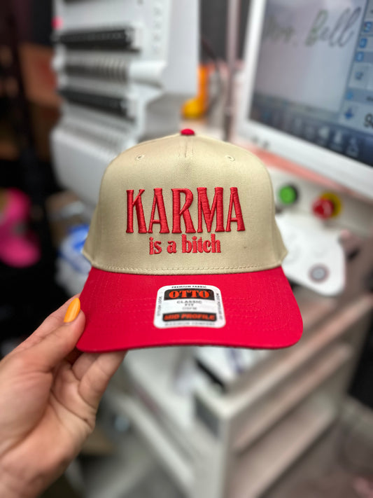 Karma puff embroidered trucker hat