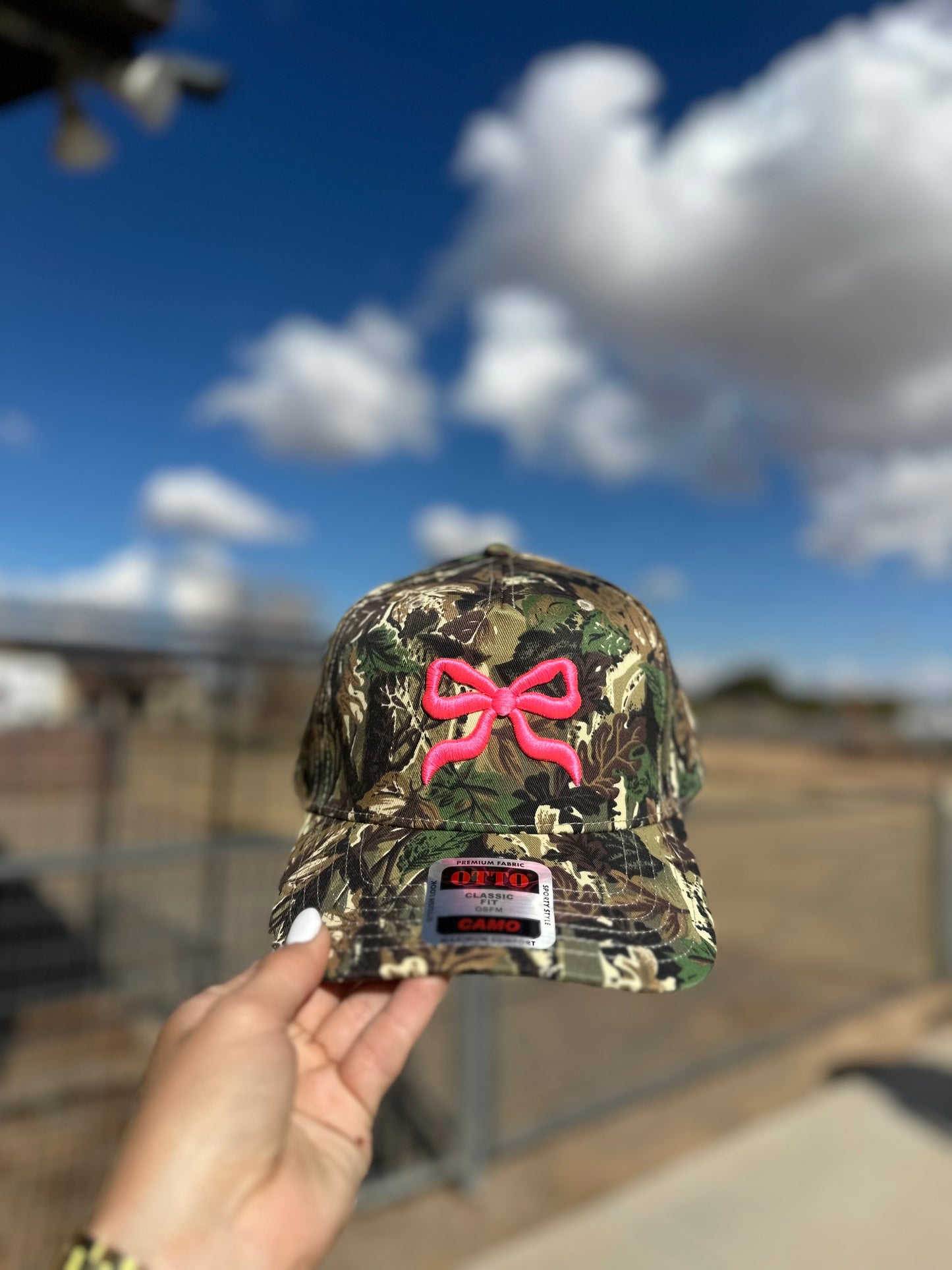 Bow puff embroidered trucker hat