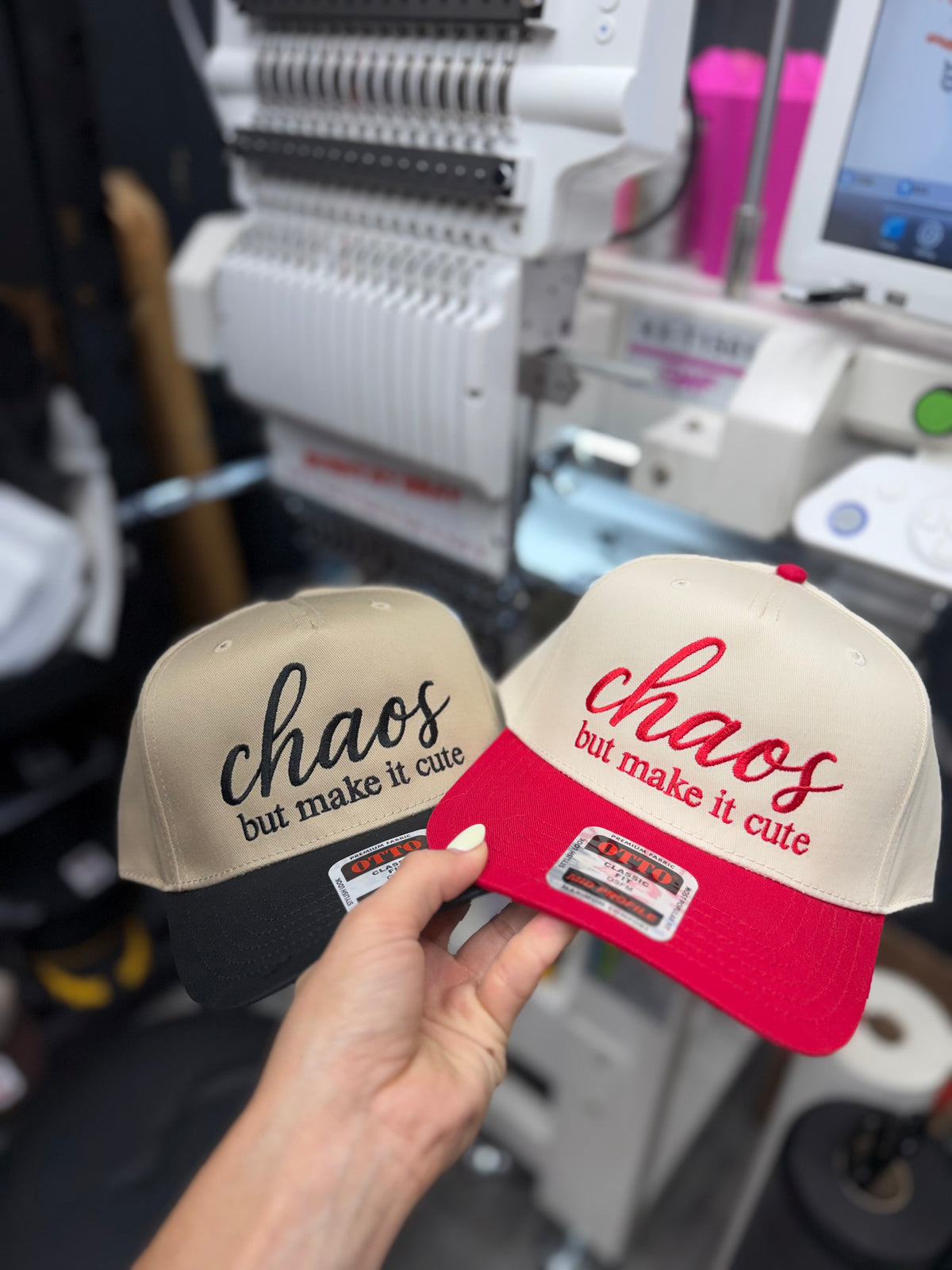 a pair of hats in a hand