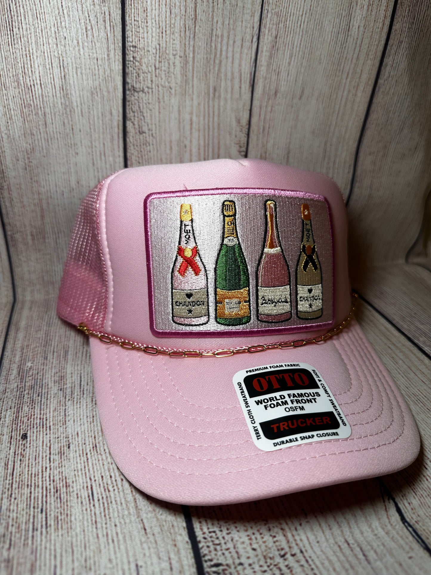 Pink champagne trucker hat