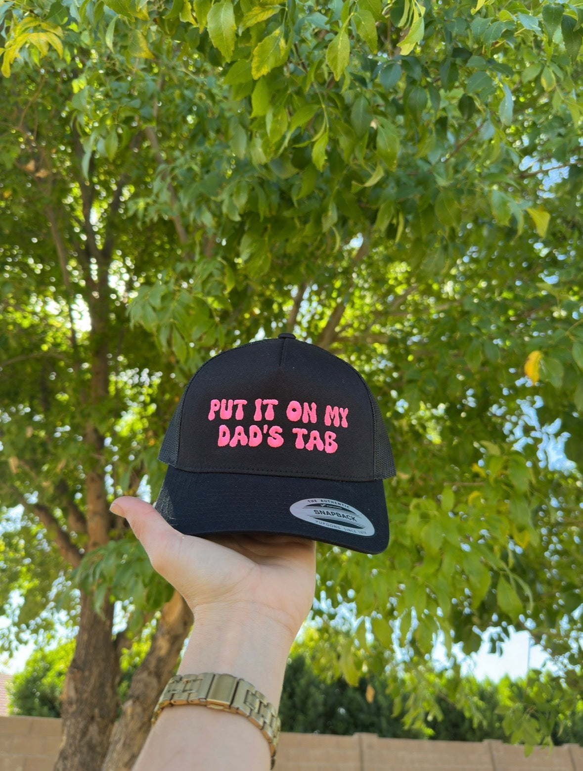 Put it on my dad's tab embroidered trucker hat