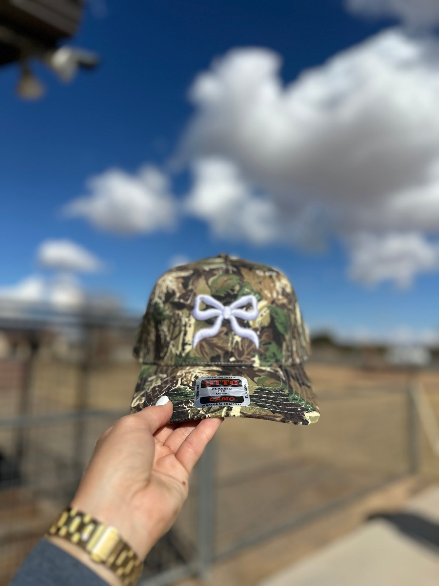 Bow puff embroidered trucker hat