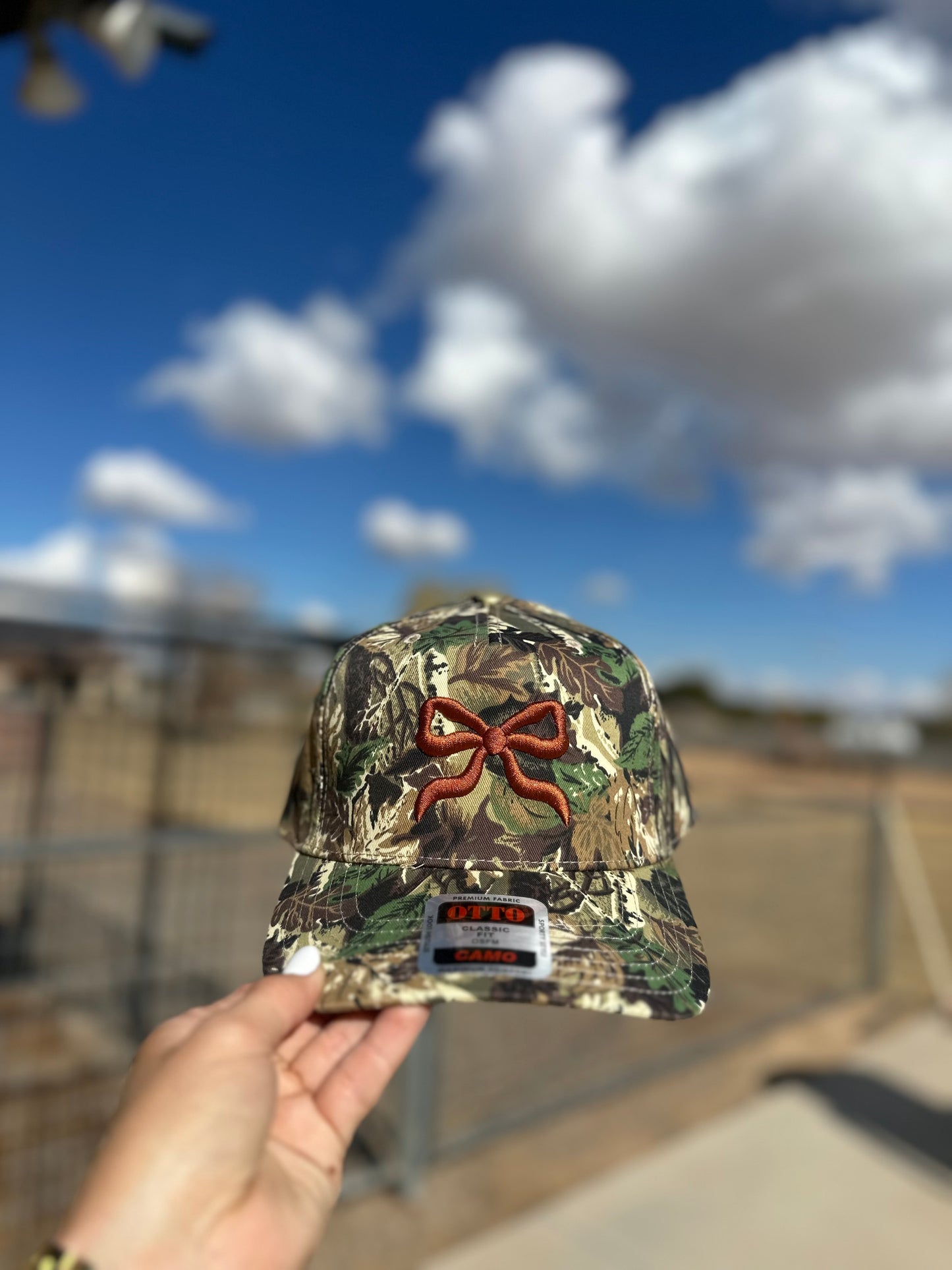 Bow puff embroidered trucker hat