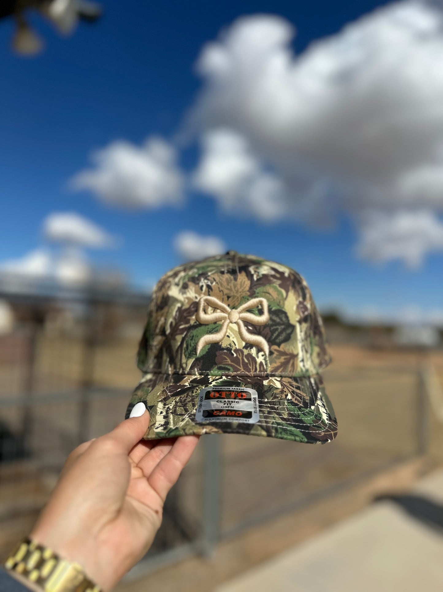 Bow puff embroidered trucker hat