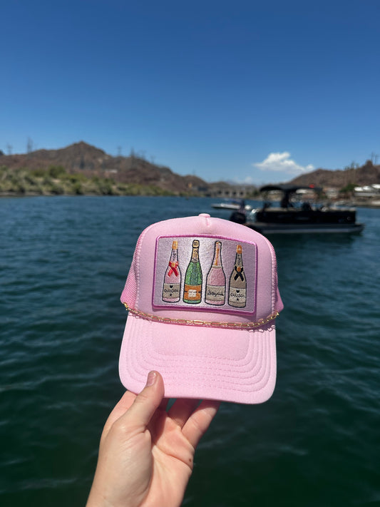 Pink champagne trucker hat